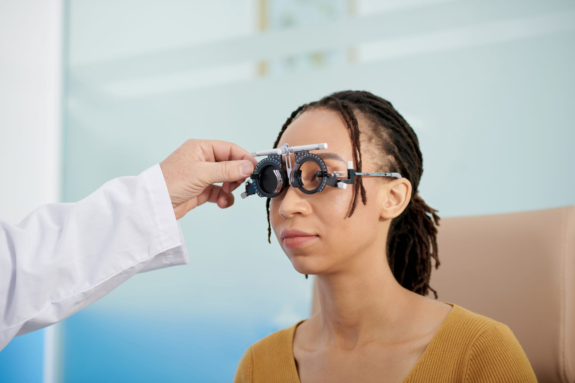 Young woman undergoing a comprehensive eye exam
